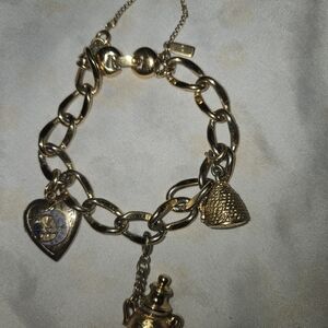 Gold Charm Braceletby Monet